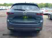 2023 Mazda CX-5 S Carbon Edition z VIN JM3KFBCM8P0223695, wystawiony jako IAAI lot #42379352 z przebiegiem 41 849 mil mil oraz . Historia ofert i sprzedaży dostępna na DreamBid. Obrazek 16.