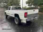 1999 Dodge 2500 with VIN 1B7KF2364XJ585723, listed as a Copart auction lot 86598885 with 272,905 mi miles and Clean title. Bid and sale history available at DreamBid. Image 3.