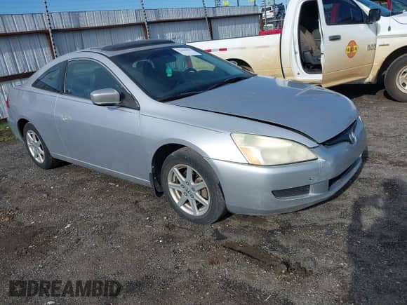 2004 Honda Accord EX with VIN 1HGCM82664A010907, listed as a IAAI auction lot 42086599 with 215,595 mi miles and . Bid and sale history available at DreamBid. Image 1.