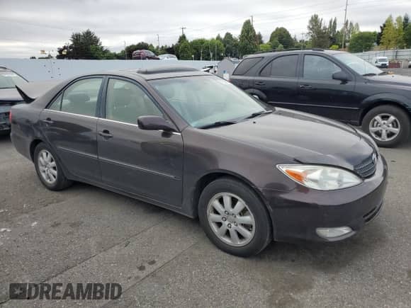 2003 Toyota Camry LE с VIN JTDBF30K330092929, выставлен на аукционе Copart как лот 71908275 с пробегом 163 921 миль миль и Списание • Salvage title. История ставок и продаж доступна на DreamBid. Изображение 4.