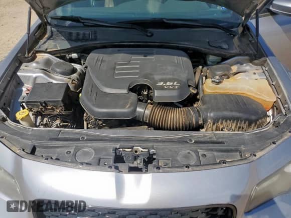 2015 Chrysler 300 S with VIN 2C3CCABG5FH868203, listed as a Copart auction lot 71825275 with 106,344 mi miles and Salvage title. Bid and sale history available at DreamBid. Image 11.