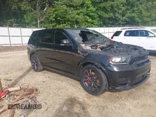 2018 Dodge Durango SRT with VIN 1C4SDJGJXJC213653, listed as a IAAI auction lot 42765062 with Not provided miles and . Bid and sale history available at DreamBid. Image 1.