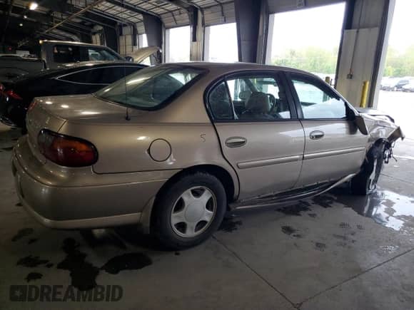 2000 Chevrolet Malibu LS z VIN 1G1NE52J9Y6326326, wystawiony jako Copart lot #72615584 z przebiegiem 235 408 mil mil oraz Szkoda całkowita • Salvage title. Historia ofert i sprzedaży dostępna na DreamBid. Obrazek 3.