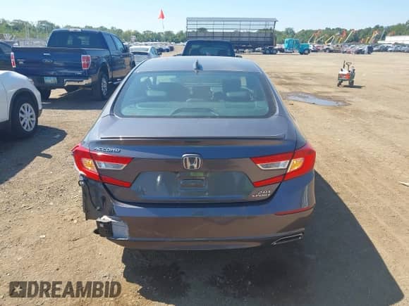 2018 Honda Accord Sport with VIN 1HGCV2F33JA052750, listed as a IAAI auction lot 43132811 with 57,286 mi miles and . Bid and sale history available at DreamBid. Image 17.