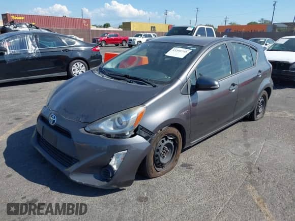 2015 Toyota Prius One z VIN JTDKDTB38F1111002, wystawiony jako IAAI lot #43250745 z przebiegiem 229 161 mil mil oraz . Historia ofert i sprzedaży dostępna na DreamBid. Obrazek 2.