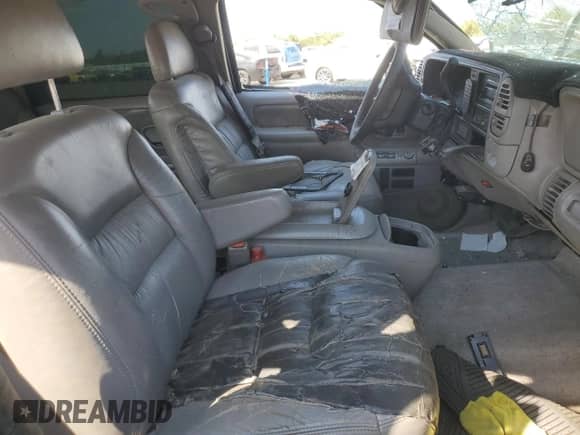 1999 Chevrolet Suburban z VIN 3GNFK16R3XG168695, wystawiony jako Copart lot #71015555 z przebiegiem 166 386 mil mil oraz Szkoda całkowita • Salvage title. Historia ofert i sprzedaży dostępna na DreamBid. Obrazek 7.