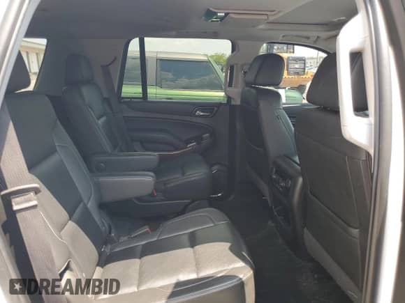 2018 Chevrolet Tahoe Premier with VIN 1GNSKCKC4JR376233, listed as a Copart auction lot 68965735 with 95,327 mi miles and Salvage title. Bid and sale history available at DreamBid. Image 11.