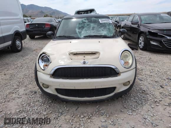 2009 MINI Hardtop S with VIN WMWMF73569TW87347, listed as a Copart auction lot 59445035 with 118,336 mi miles and Salvage title. Bid and sale history available at DreamBid. Image 5.