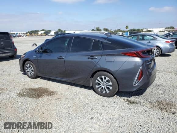 2020 Toyota Prius LE z VIN JTDKARFP7L3134814, wystawiony jako Copart lot #84899765 z przebiegiem 16 798 mil mil oraz Szkoda całkowita • Salvage title. Historia ofert i sprzedaży dostępna na DreamBid. Obrazek 2.