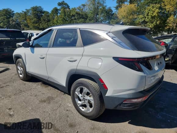 2023 Hyundai Tucson SEL with VIN 5NMJBCAE6PH242960, listed as a Copart auction lot 86257765 with 27,813 mi miles and Salvage title. Bid and sale history available at DreamBid. Image 2.