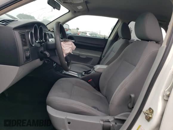 2007 Dodge Magnum with VIN 2D4FV47V57H623322, listed as a Copart auction lot 73356244 with 200,976 mi miles and Salvage title. Bid and sale history available at DreamBid. Image 7.