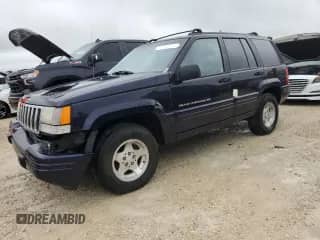 1998 Jeep Grand Cherokee with VIN 1J4FX48S1WC244308, listed as a Copart auction lot 74384714 with Not provided miles and Non repairable. Bid and sale history available at DreamBid. Image 1.