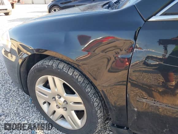 2011 Chevrolet Impala LT Retail z VIN 2G1WB5EK6B1330821, wystawiony jako IAAI lot #43146376 z przebiegiem 200 488 mil mil oraz . Historia ofert i sprzedaży dostępna na DreamBid. Obrazek 6.