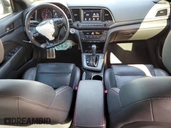 2018 Hyundai Elantra Sport с VIN KMHD04LB0JU506651, выставлен на аукционе Copart как лот 82024445 с пробегом 106 565 миль миль и Списание • Salvage title. История ставок и продаж доступна на DreamBid. Изображение 8.