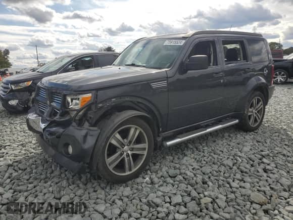 2011 Dodge Nitro Shock с VIN 1D4PU7GX1BW587469, выставлен на аукционе Copart как лот 75915524 с пробегом 157 814 миль миль и Списание • Salvage title. История ставок и продаж доступна на DreamBid. Изображение 1.