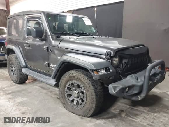 2021 Jeep Wrangler Sport S с VIN 1C4HJXAG2MW502452, выставлен на аукционе IAAI как лот 42031159 с пробегом 87 952 миль миль и . История ставок и продаж доступна на DreamBid. Изображение 1.