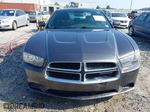 2014 Dodge Charger SE with VIN 2C3CDXBG7EH325384, listed as a IAAI auction lot 43031175 with 203,375 mi miles and . Bid and sale history available at DreamBid. Image 12.