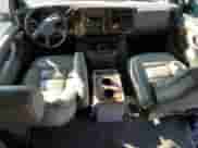 2004 Chevrolet Express Passenger with VIN 1GBFG15T841212230, listed as a Copart auction lot 61109634 with 154,493 mi miles and Salvage title. Bid and sale history available at DreamBid. Image 8.