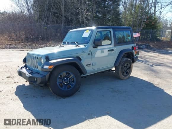 2023 Jeep Wrangler Sport with VIN 1C4GJXAN8PW640978, listed as a IAAI auction lot 41843414 with 16,440 mi miles and . Bid and sale history available at DreamBid. Image 2.