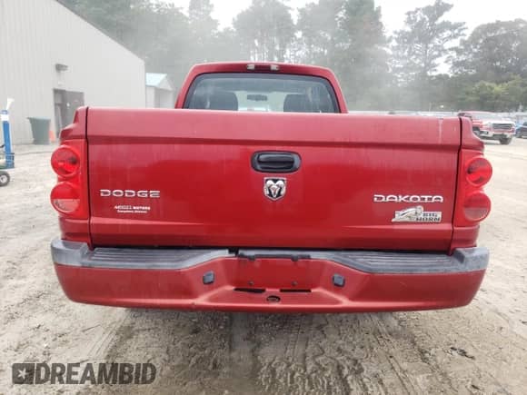 2010 Dodge Dakota z VIN 1D7CE3BK4AS100788, wystawiony jako Copart lot #67288135 z przebiegiem 111 750 mil mil oraz Szkoda całkowita • Salvage title. Historia ofert i sprzedaży dostępna na DreamBid. Obrazek 6.