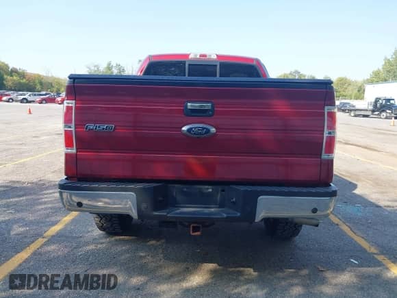 2013 Ford F-150 Lariat with VIN 1FTFW1ET5DKD04467, listed as a IAAI auction lot 43355676 with 124,871 mi miles and . Bid and sale history available at DreamBid. Image 16.