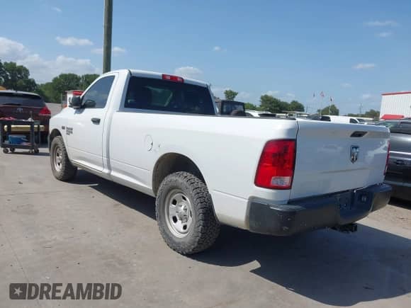 2019 Ram 1500 Tradesman z VIN 3C6JR6DT4KG648920, wystawiony jako IAAI lot #42531432 z przebiegiem 128 735 mil mil oraz . Historia ofert i sprzedaży dostępna na DreamBid. Obrazek 3.