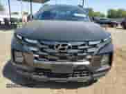 2023 Hyundai Santa Cruz Night Edition с VIN 5NTJCDAF7PH048860, выставлен на аукционе Copart как лот 72808944 с пробегом 11 449 миль миль и Списание • Salvage title. История ставок и продаж доступна на DreamBid. Изображение 5.