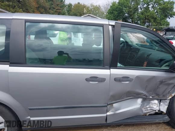 2014 Dodge Grand Caravan SE with VIN 2C4RDGBG7ER226869, listed as a IAAI auction lot 43312169 with 76,371 mi miles and . Bid and sale history available at DreamBid. Image 18.