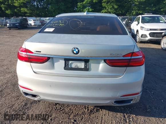 2019 BMW 7 Series 740i xDrive with VIN WBA7E4C53KGV70385, listed as a IAAI auction lot 39556837 with Not provided miles and . Bid and sale history available at DreamBid. Image 15.