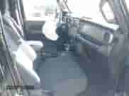 2022 Jeep Wrangler Unlimited Willys with VIN 1C4HJXDN4NW255589, listed as a IAAI auction lot 42307438 with 28,550 mi miles and . Bid and sale history available at DreamBid. Image 5.