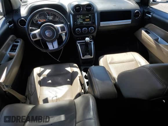 2014 Jeep Compass Limited с VIN 1C4NJDCB7ED508912, выставлен на аукционе Copart как лот 70353425 с пробегом 170 275 миль миль и Списание • Salvage title. История ставок и продаж доступна на DreamBid. Изображение 8.