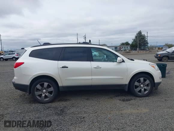 2011 Chevrolet Traverse LTZ with VIN 1GNKVLED2BJ410861, listed as a IAAI auction lot 43089578 with 188,672 mi miles and . Bid and sale history available at DreamBid. Image 14.