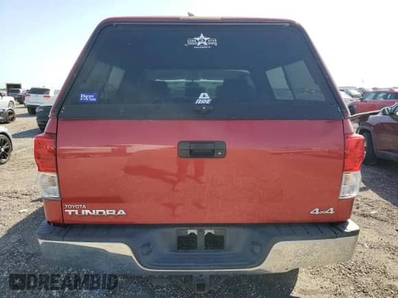 2011 Toyota Tundra SR5 with VIN 5TFDM5F18BX019134, listed as a Copart auction lot 52141595 with 79,171 mi miles and Salvage title. Bid and sale history available at DreamBid. Image 6.