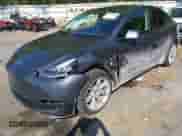 2020 Tesla Model Y Long Range with VIN 5YJYGDEE7LF016339, listed as a IAAI auction lot 43228890 with 38,227 mi miles and . Bid and sale history available at DreamBid. Image 6.