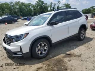 2023 Honda Passport TrailSport с VIN 5FNYF8H69PB023104, выставлен на аукционе Copart как лот 66778505 с пробегом 60 081 миль миль и Списание • Salvage title. История ставок и продаж доступна на DreamBid. Изображение 1.