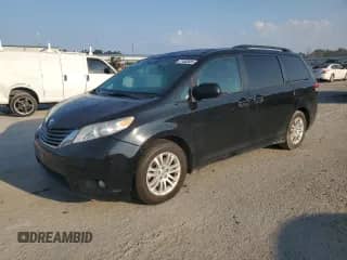 2014 Toyota Sienna XLE with VIN 5TDYK3DC4ES525330, listed as a Copart auction lot 71462685 with 201,604 mi miles and Salvage title. Bid and sale history available at DreamBid. Image 1.