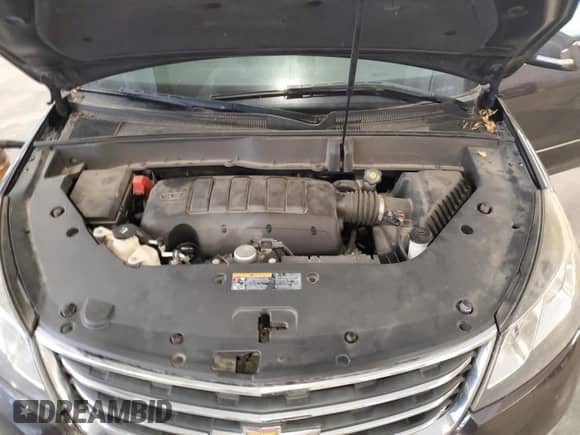 2015 Chevrolet Traverse LTZ с VIN 1GNKVJKD6FJ329151, выставлен на аукционе Copart как лот 70154475 с пробегом 178 987 миль миль и Списание • Salvage title. История ставок и продаж доступна на DreamBid. Изображение 12.