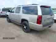 2009 Chevrolet Suburban LTZ z VIN 1GNFK363X9J100709, wystawiony jako IAAI lot #42687530 z przebiegiem 251 856 mil mil oraz . Historia ofert i sprzedaży dostępna na DreamBid. Obrazek 3.