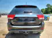 2012 Jeep Grand Cherokee Overland with VIN 1C4RJFCT9CC346497, listed as a Copart auction lot 63004635 with 142,623 mi miles and Salvage title. Bid and sale history available at DreamBid. Image 6.