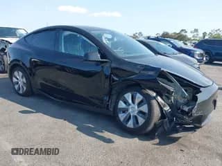 2023 Tesla Model Y Long Range z VIN 7SAYGAEE9PF851348, wystawiony jako IAAI lot #43167064 z przebiegiem Nie podano mil oraz . Historia ofert i sprzedaży dostępna na DreamBid. Obrazek 1.