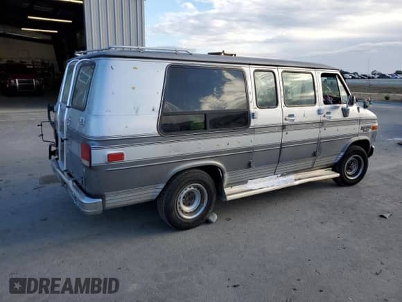 1991 Chevrolet Sportvan с VIN 1GBEG25K1M7126120, выставлен на аукционе Copart как лот 86338185 с пробегом 255 060 миль миль и Списание • Salvage title. История ставок и продаж доступна на DreamBid. Изображение 3.