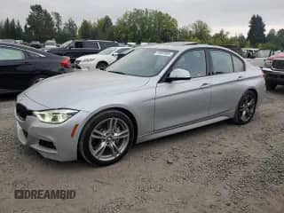 2016 BMW 3 Series 328i with VIN WBA8E9G52GNU28298, listed as a Copart auction lot 70507005 with 69,250 mi miles and Salvage title. Bid and sale history available at DreamBid. Image 1.