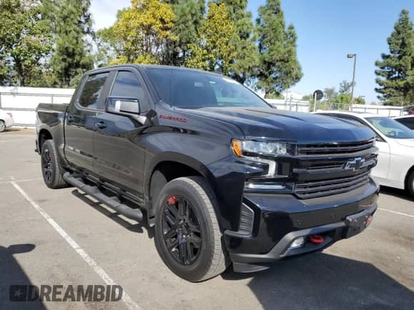2022 Chevrolet Silverado 1500 RST with VIN 1GCPWDED5NZ142606, listed as a Copart auction lot 79077014 with 26,769 mi miles and Salvage title. Bid and sale history available at DreamBid. Image 4.