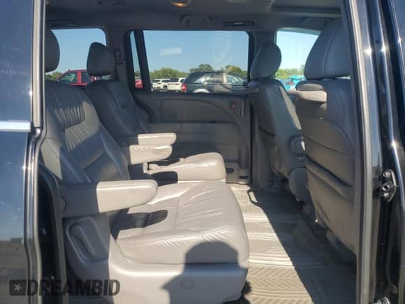 2010 Honda Odyssey Touring с VIN 5FNRL3H90AB102064, выставлен на аукционе Copart как лот 84548755 с пробегом 229 404 миль миль и Списание • Salvage title. История ставок и продаж доступна на DreamBid. Изображение 11.