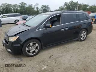 2013 Honda Odyssey Touring с VIN 5FNRL5H92DB045012, выставлен на аукционе Copart как лот 81516975 с пробегом 189 466 миль миль и Списание • Salvage title. История ставок и продаж доступна на DreamBid. Изображение 1.