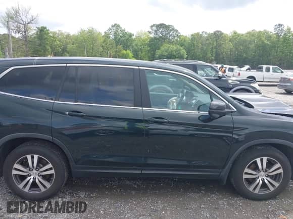 2016 Honda Pilot EX-L z VIN 5FNYF5H85GB046119, wystawiony jako IAAI lot #42118614 z przebiegiem 409 148 mil mil oraz . Historia ofert i sprzedaży dostępna na DreamBid. Obrazek 13.