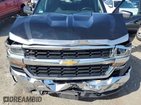 2018 Chevrolet Silverado 1500 LT with VIN 1GCVKREHXJZ202831, listed as a Copart auction lot 66719165 with 93,041 mi miles and Salvage title. Bid and sale history available at DreamBid. Image 11.