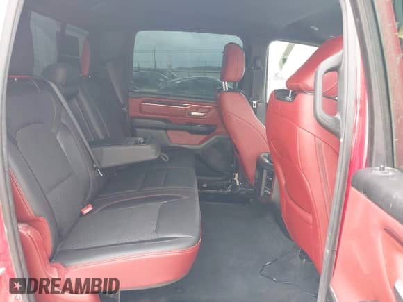 2022 Ram 1500 Rebel z VIN 1C6SRFLTXNN362961, wystawiony jako IAAI lot #42605488 z przebiegiem 121 529 mil mil oraz . Historia ofert i sprzedaży dostępna na DreamBid. Obrazek 8.