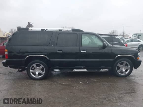 2006 Chevrolet Suburban LTZ with VIN 1GNFK16U36J170688, listed as a IAAI auction lot 38123299 with 134,730 mi miles and . Bid and sale history available at DreamBid. Image 13.