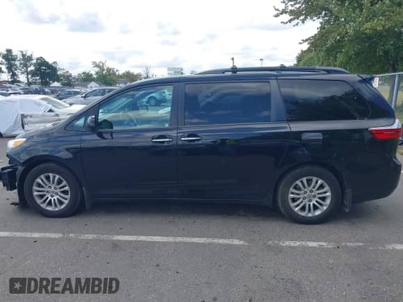 2015 Toyota Sienna XLE with VIN 5TDYK3DCXFS594038, listed as a IAAI auction lot 43181227 with 95,271 mi miles and . Bid and sale history available at DreamBid. Image 14.